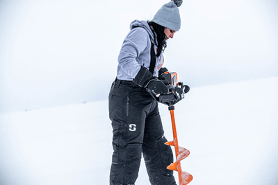 Lifestyle Image of Women Ice Fishing Wearing StrikerICE Prism Pants